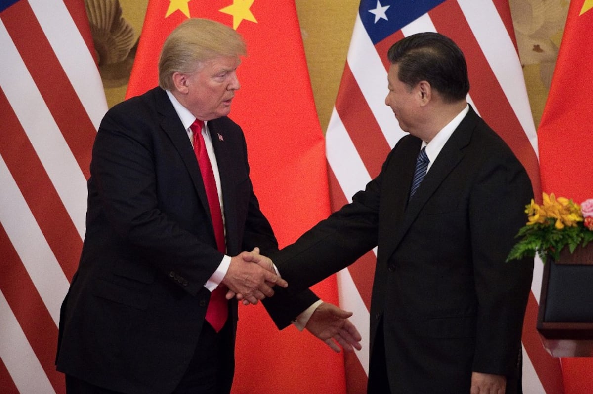 Acuerdo preliminar entre EU y China reduce guerra comercial